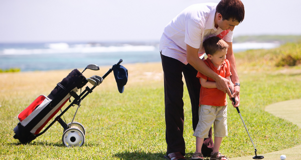 golfer with child benefit from chiropractic